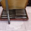 12 grands couteaux de table Ercuis en métal argenté